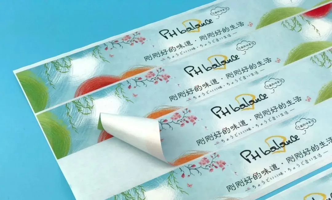 卷筒不干胶标签印刷覆膜不牢,杂质、卷曲问题的解决方法
